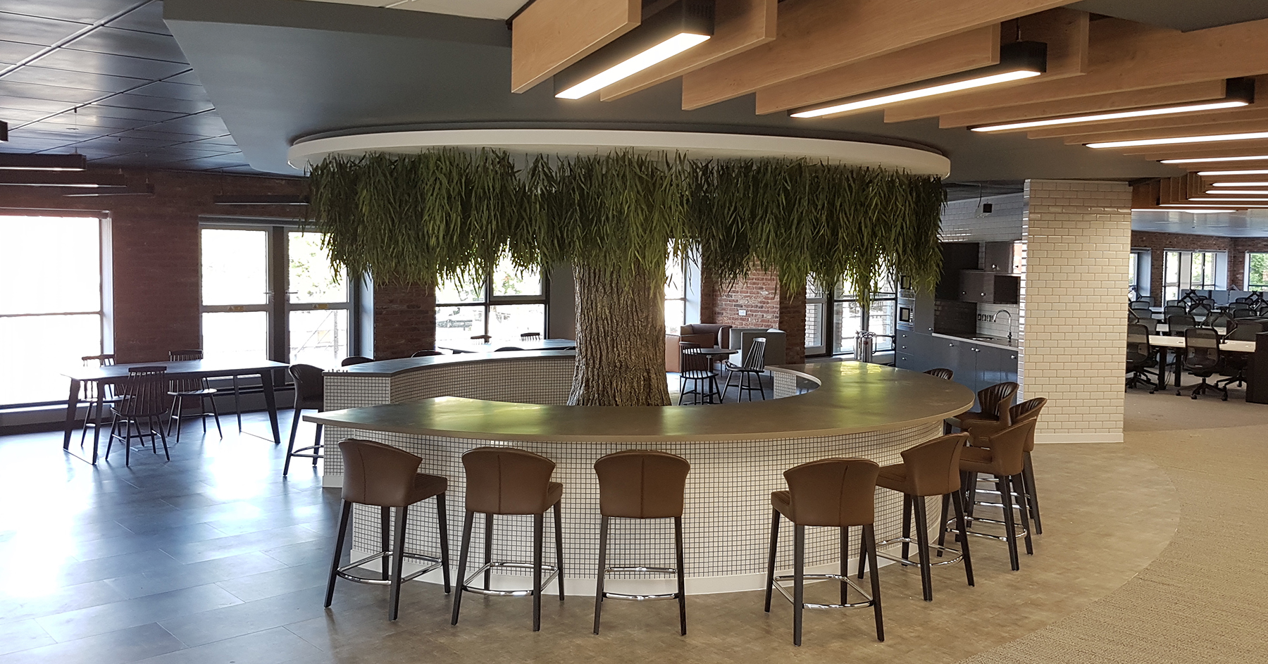 Biophilic Design - Office with relaxation area tree and seating